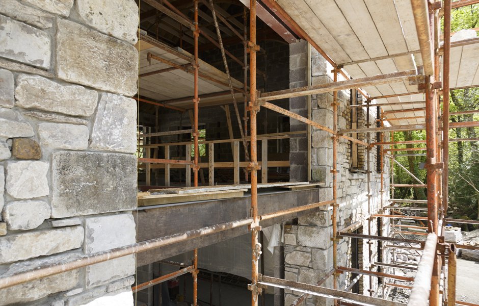 old timber beam entrance stone work cork